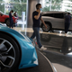 Visitors look at vehicles at the NIO flagship store in Beijing on Thursday, Aug. 20, 2020.